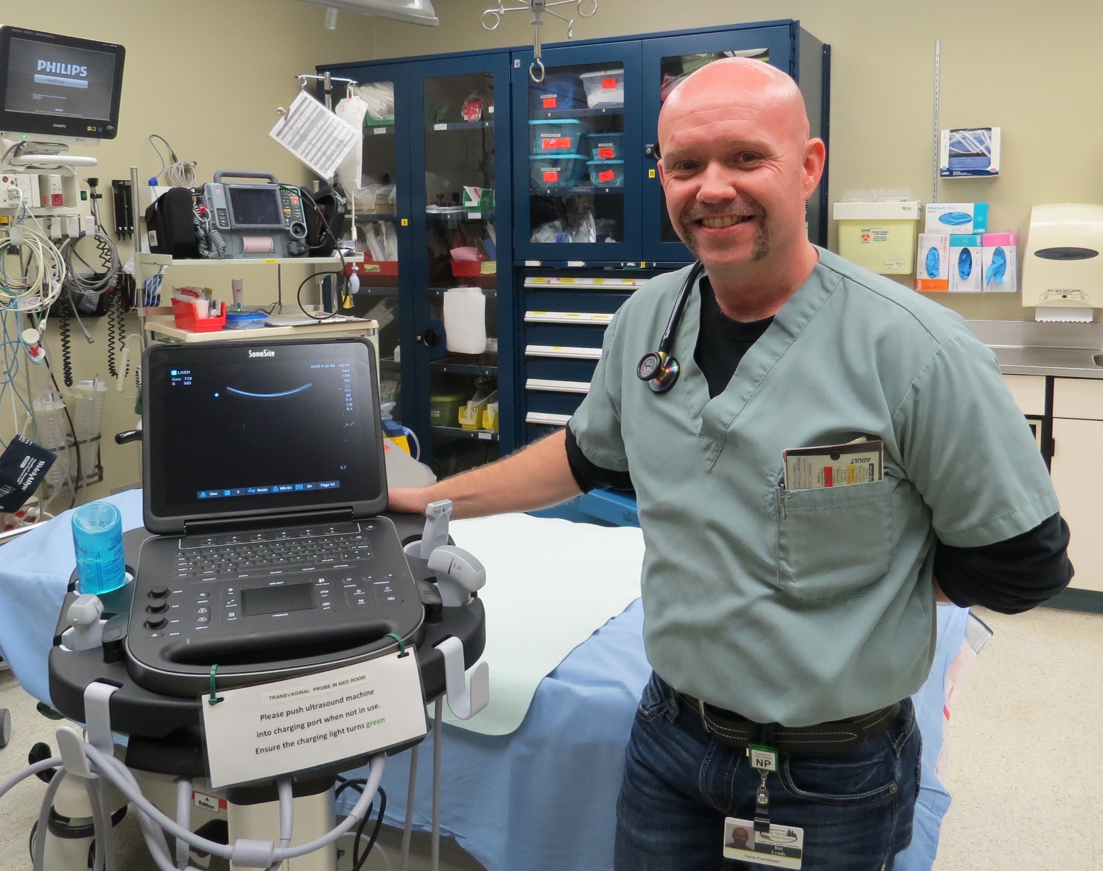 D. Lynds with POC ultrasound unit